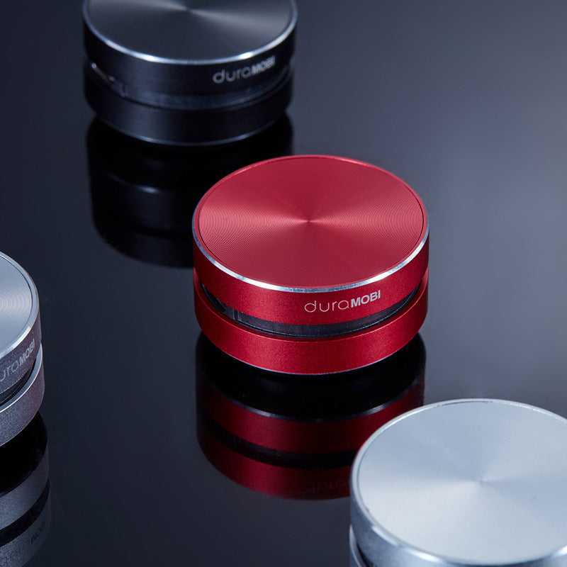 Black , red and silver hummingbird speakers .