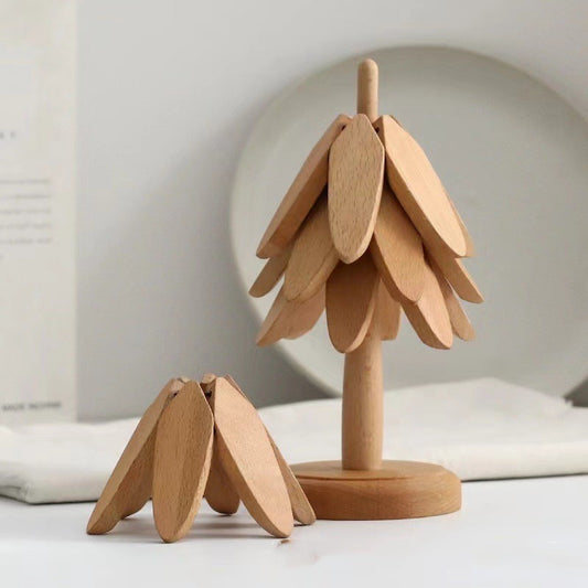 Wooden Tree Folding pad on table .