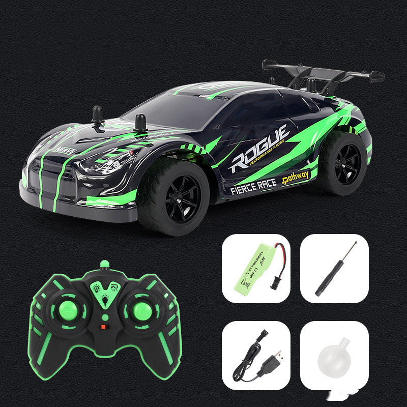 Green RC drift car set with remote control, battery, charger, screwdriver, and refillable water tank.