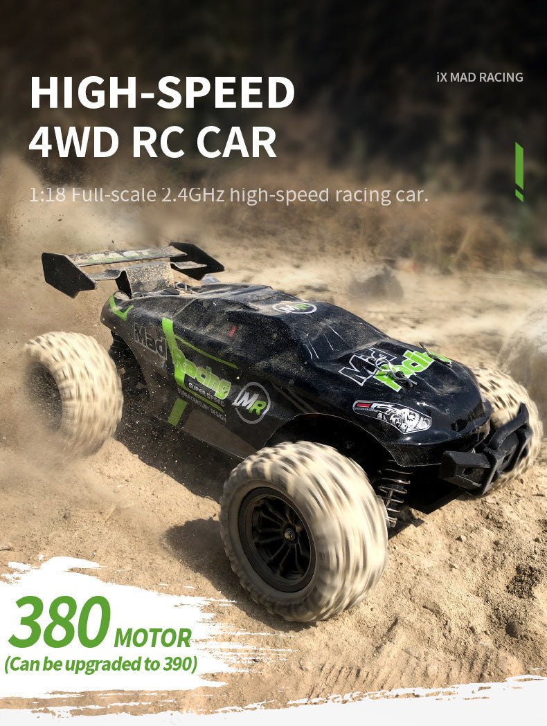 1:18 scale 4WD RC racing car with 380 motor kicking up sand at high speed