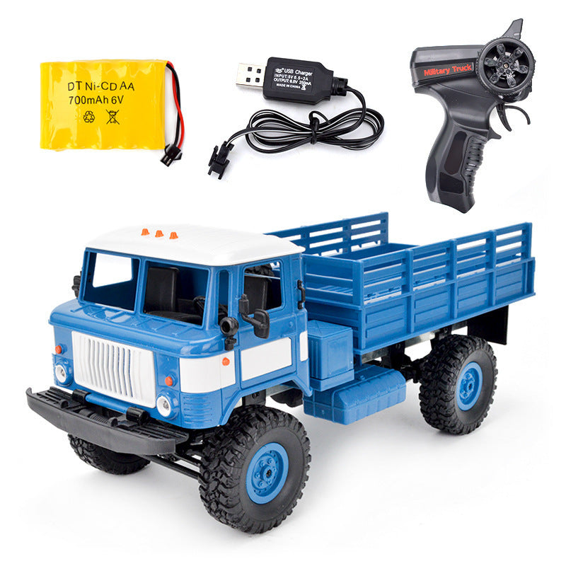 Blue and white military-style RC truck with remote, battery, and charger