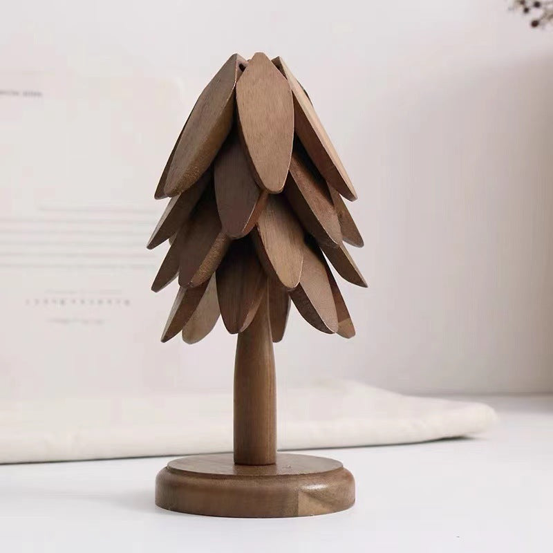 Wooden Tree Folding pad on table .