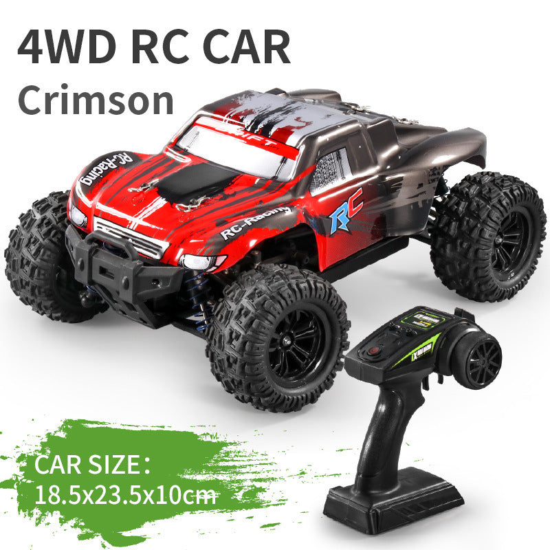 Red and black 4WD RC car with remote control on a white background