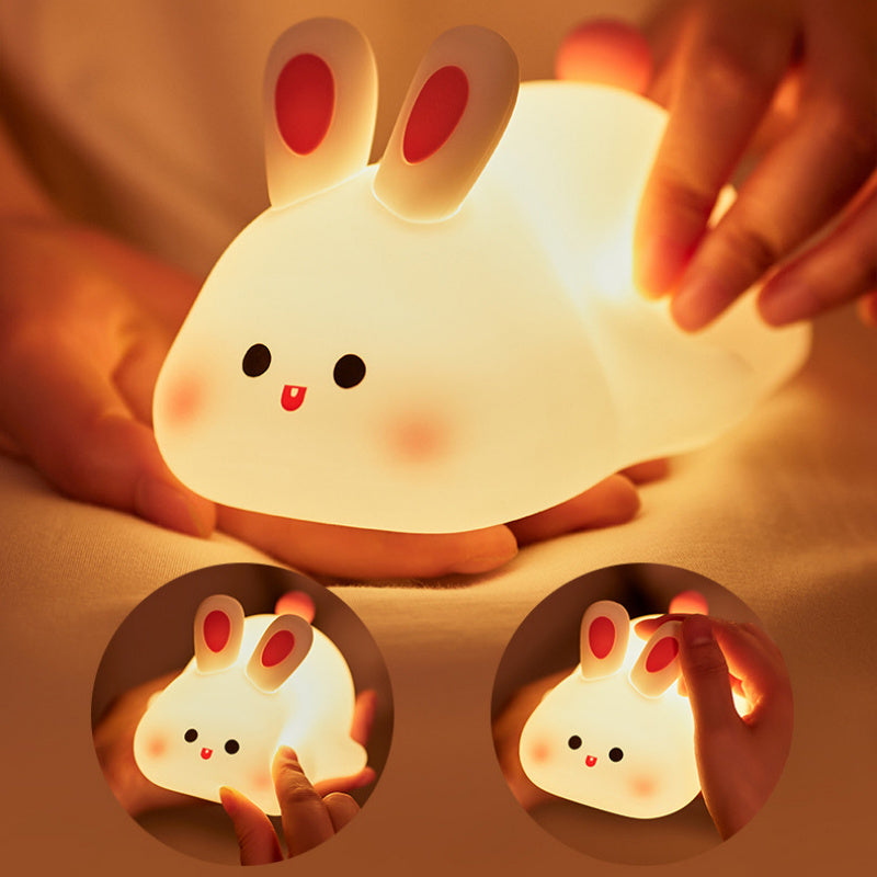  Touch Sensor Cartoon Kid's Nightlights in hands .