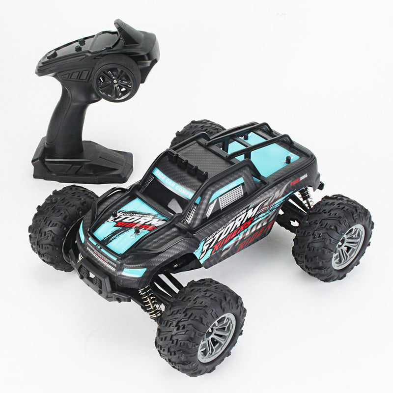 1/16 4WD off-road RC monster truck in blue with 2.4GHz pistol remote and large all-terrain tires.