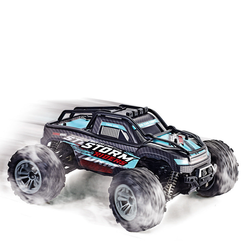 High-speed remote control truck drifting on dirt, big knobby tires kicking up dust; Storm Riders graphics.