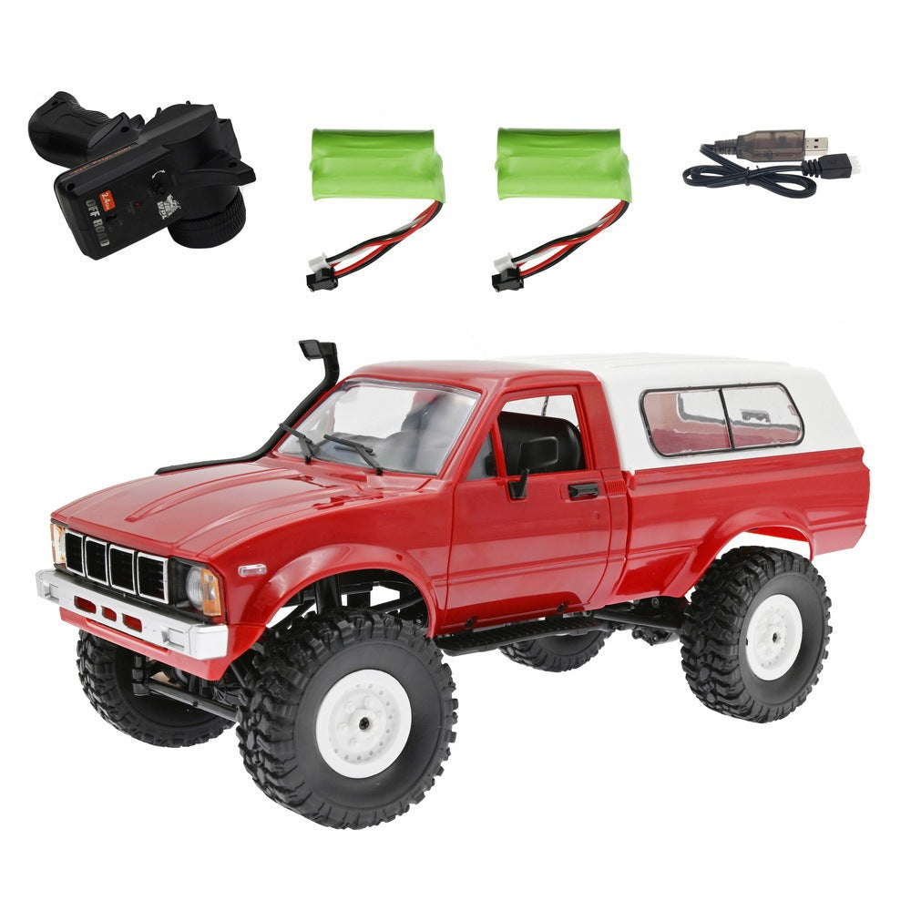 Red toy truck with accessories on a white background