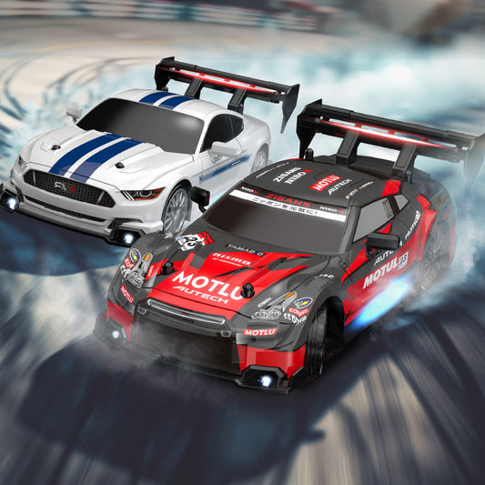 Two high-speed RC drift cars racing on a smoky track, one in red MOTUL livery and the other in white with blue stripes.