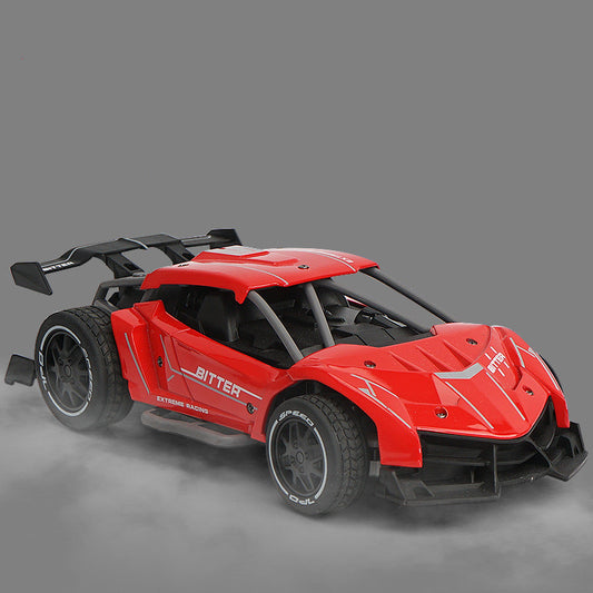 Red toy car with black accents on a gray background