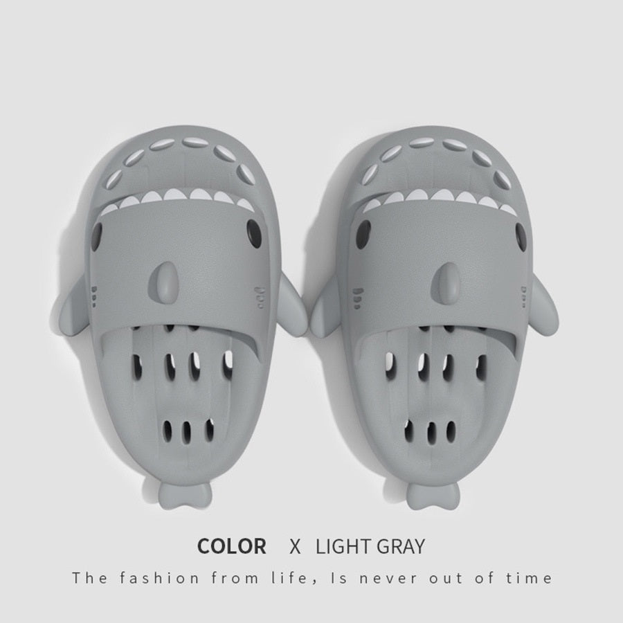 Light grey cute slippers .