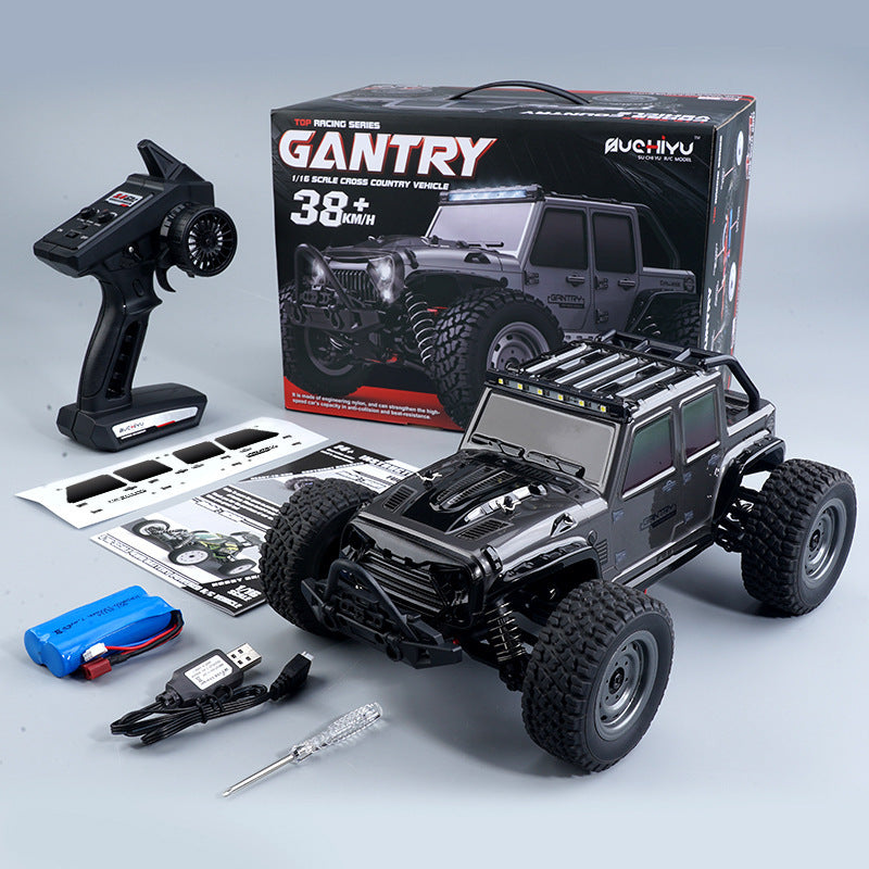 Black RC truck with accessories and box set up for display