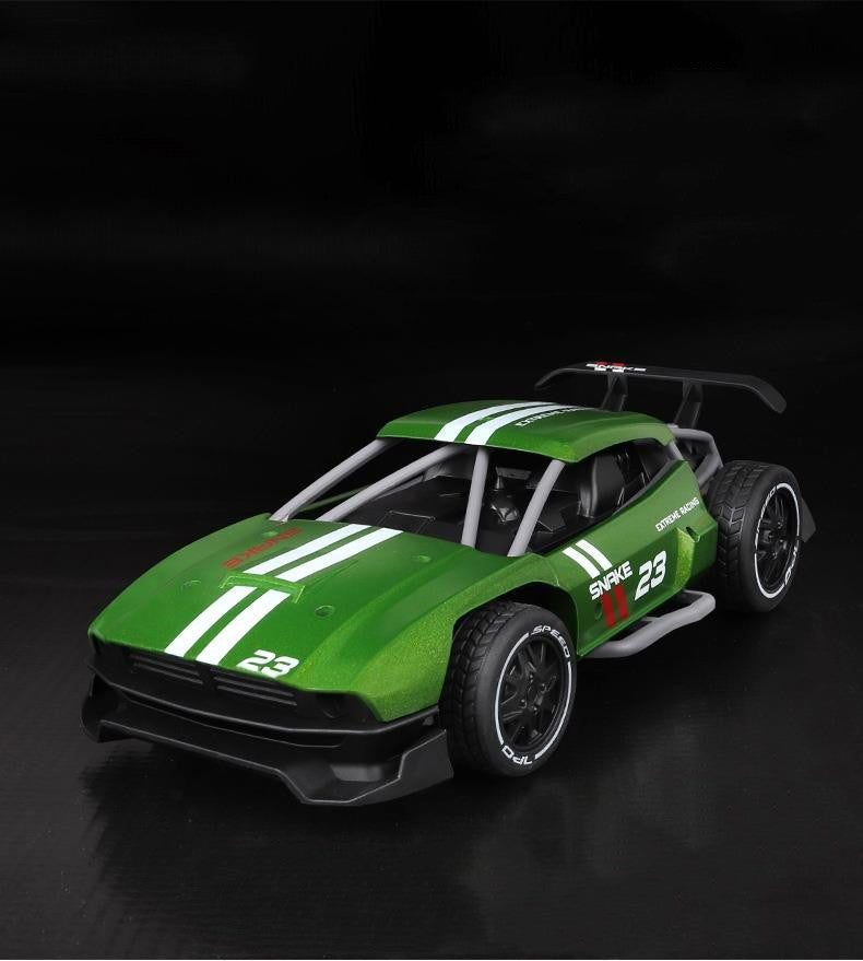 Green race car model with white stripes and number 23 on a black background