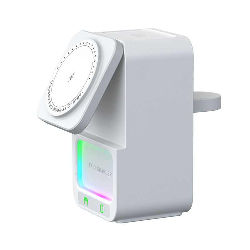 A Bluetooth speaker and a wireless charger integrated into a single device, with a black body and a white top, displaying LED indicators and Bluetooth signal icons.