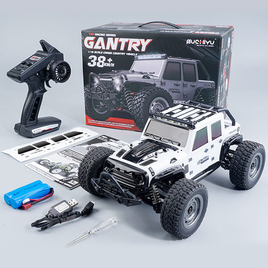 Gantry RC vehicle set with remote control, battery, and accessories on a gray background
