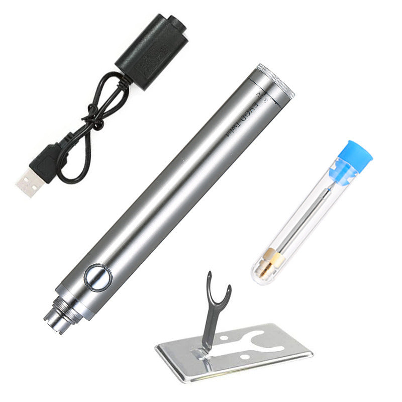 Silver EVOD Twist mini soldering iron set with adjustable voltage, USB charging cable, replacement soldering tip in case, and metal stand.