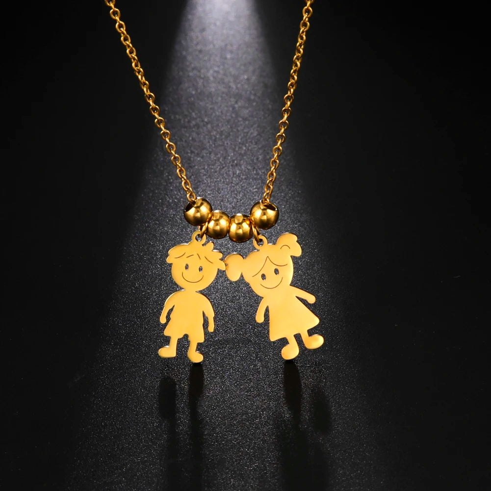 Gold necklace with child-shaped pendants on a black background
