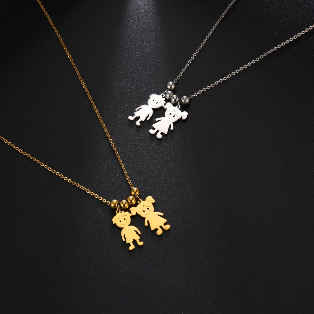Two necklaces with teddy bear pendants on a black background