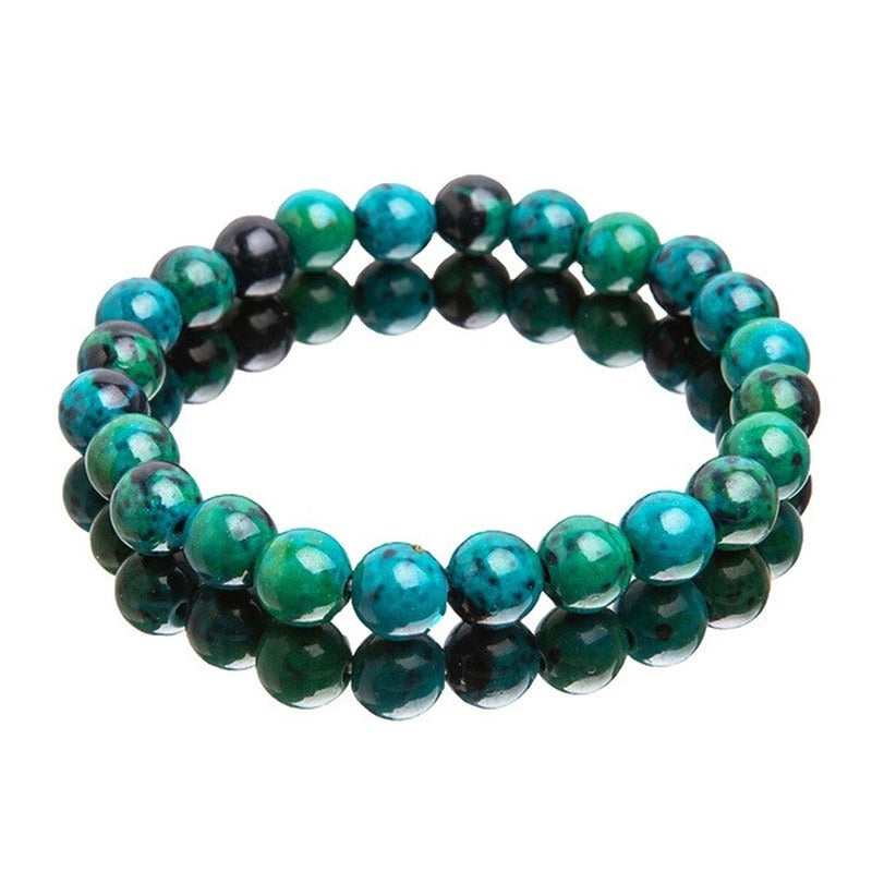 Green and black beaded bracelet on a white background
