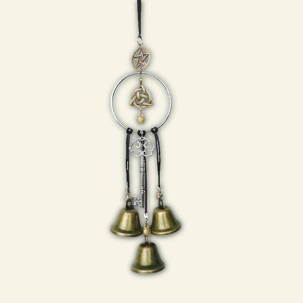 Decorative hanging with Celtic symbols and bells on a beige background