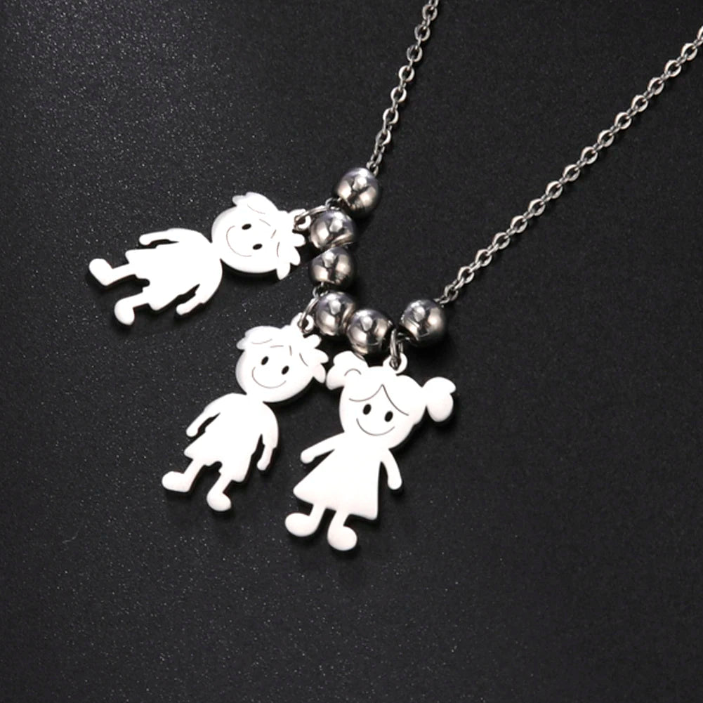 Silver necklace with cartoon character pendants on a black background