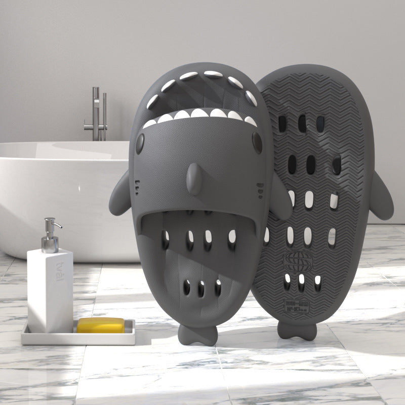 Dark grey cute slippers .