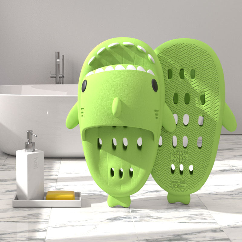 green cute slippers .