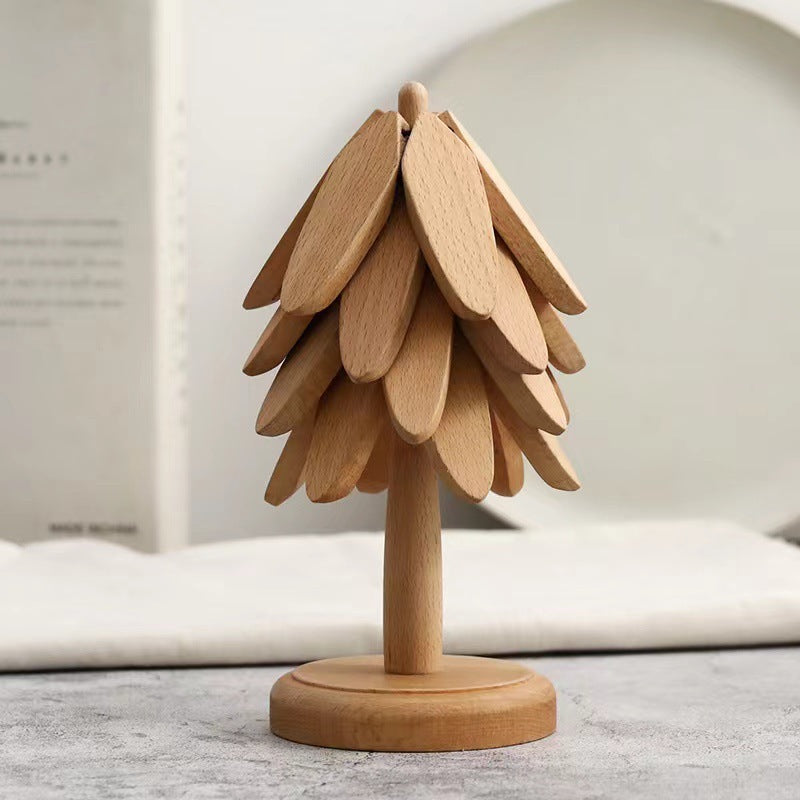 Wooden Tree Folding pad on table .