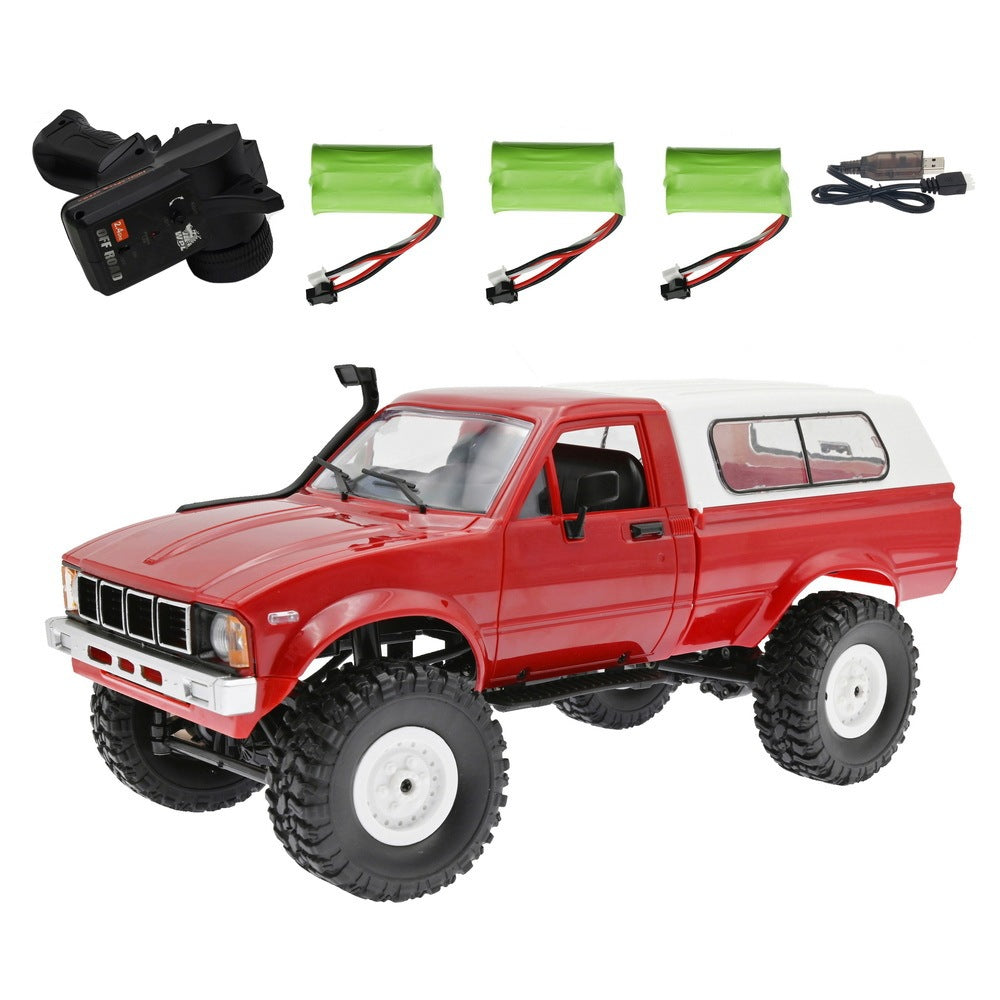 Red toy truck with accessories on a white background