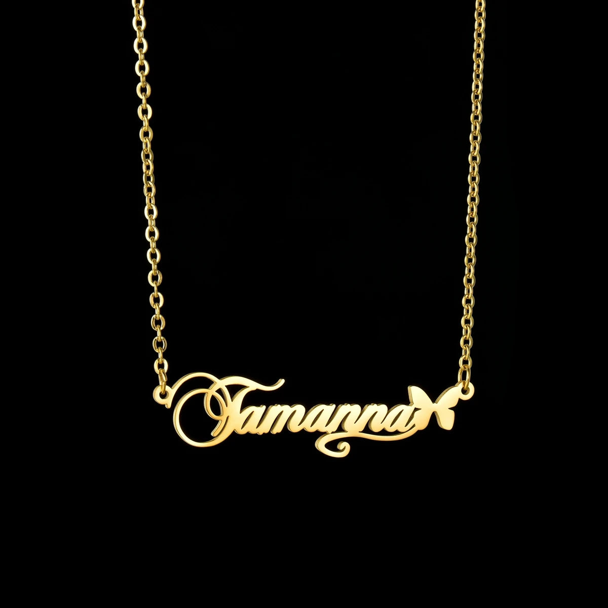 Gold name necklace on a black background
