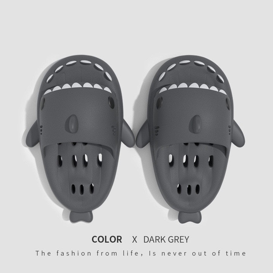 Dark grey cute slippers .