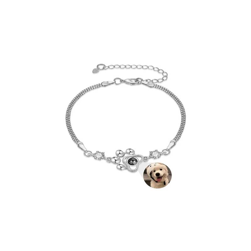 Bracelet with a dog photo charm on a white background