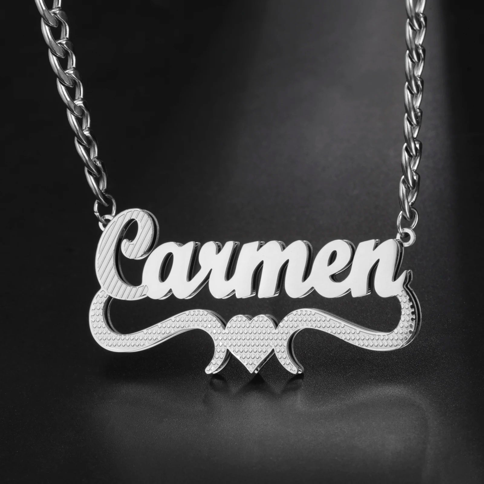 Silver 'Carmen' necklace on a dark background