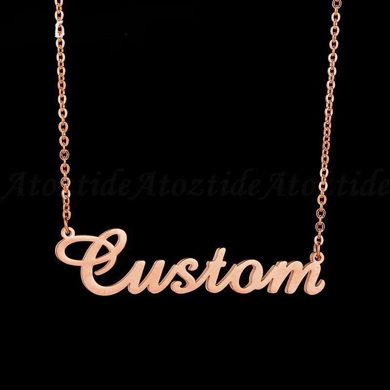 Rose gold 'Custom' necklace on a black background