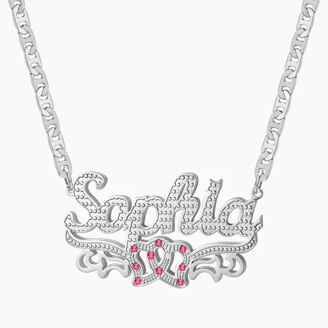 Silver necklace with 'Sophie' and pink heart-shaped stones on a white background