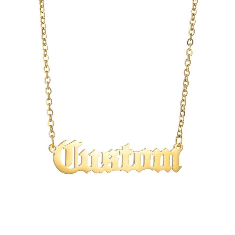 Gold 'Custom' necklace on a white background