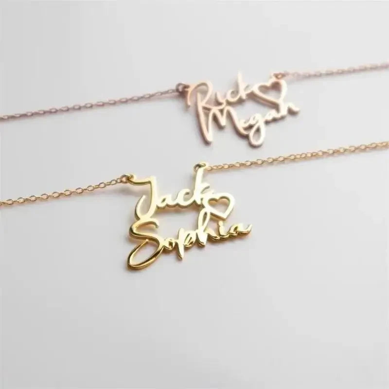 Gold name necklaces on a light gray background
